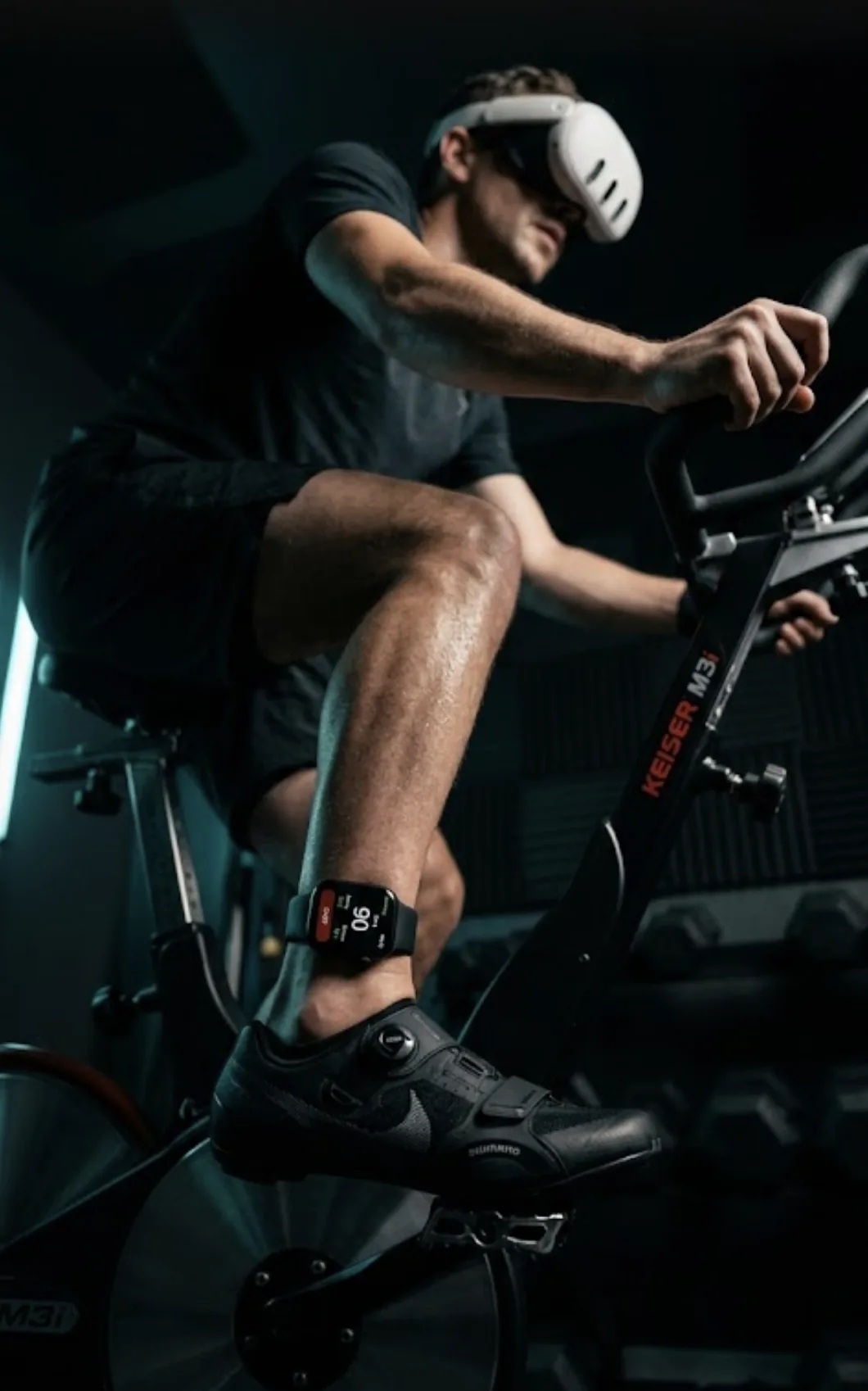 Cyclist in a VR headset with the watch on the ankle